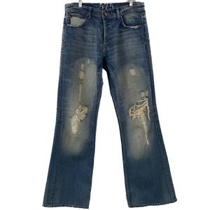Men’s 575 distressed bootcut button fly jean
